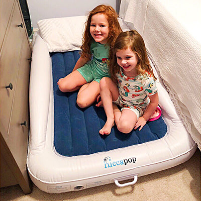travel bed with safety rails